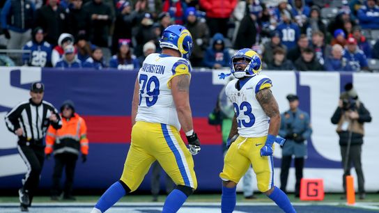 Los Angeles Rams running back Kyren Williams (23) celebrates his touchdown against the New York Giants with offensive tackle Rob Havenstein (79) during the third quarter at MetLife Stadium.
