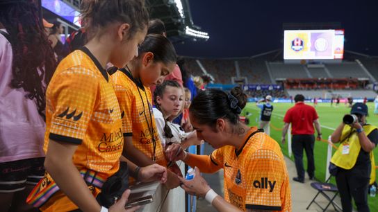 Jun 22, 2024; Houston, Texas, USA; Houston Dash forward Diana Ordonez (9) signs autographs for fans after the match against San Diego Wave FC at Shell Energy Stadium.
