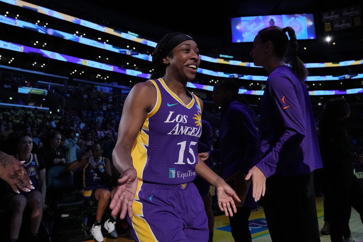 Jul 16, 2024; Los Angeles, California, USA; LA Sparks guard Aari McDonald (15) is introduced before the game against the Seattle Storm at Crypto.com Arena. Jul 16, 2024; Los Angeles, California, USA; LA Sparks guard Aari McDonald (15) is introduced before the game against the Seattle Storm at Crypto.com Arena.
