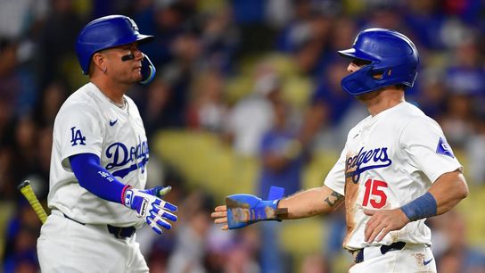 Dodgers exercise club options on Rojas and Barnes taken in Los Angeles (Los Angeles Dodgers)