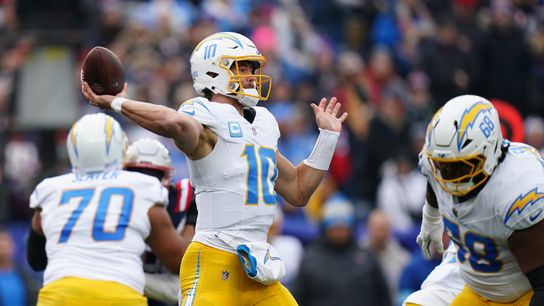 Dec 28, 2024; Foxborough, Massachusetts, USA; Los Angeles Chargers quarterback Justin Herbert (10) passes the ball against the New England Patriots in the first quarter at Gillette Stadium. 