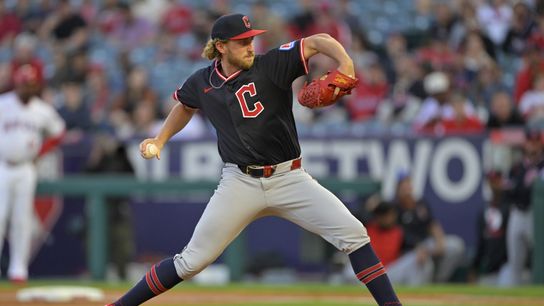 Cleveland Guardians starting pitcher Tanner Bibee (28) delivers to the plate in the first inning against the Los Angeles Angels at Angel Stadium. Cleveland Guardians starting pitcher Tanner Bibee (28) delivers to the plate in the first inning against the Los Angeles Angels at Angel Stadium.
