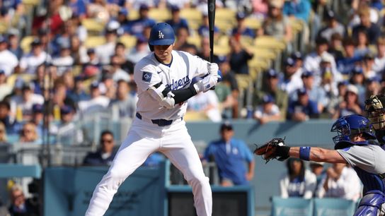 Los Angeles Dodgers designated hitter player Shohei Ohtani (17) reacts to striking out against the Chicago Cubs during the first inning of the game at Dodger Stadium.