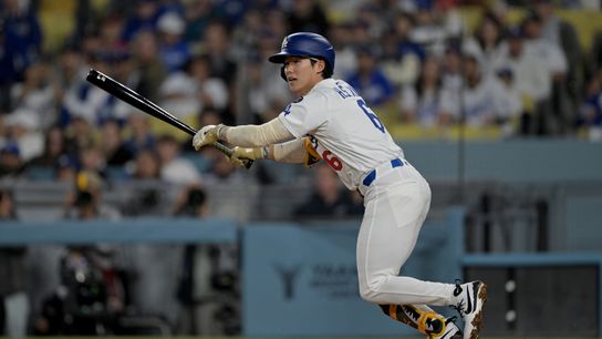 Los Angeles Dodgers second baseman Hyeseong Kim (6) singles during the third inning against the Los Angeles Angels at Dodger Stadium. 