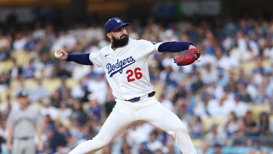 Los Angeles Dodgers starting pitcher Tony Gonsolin (26) throws during the first inning against the New York Yankees at Dodger Stadium. Los Angeles Dodgers starting pitcher Tony Gonsolin (26) throws during the first inning against the New York Yankees at Dodger Stadium.