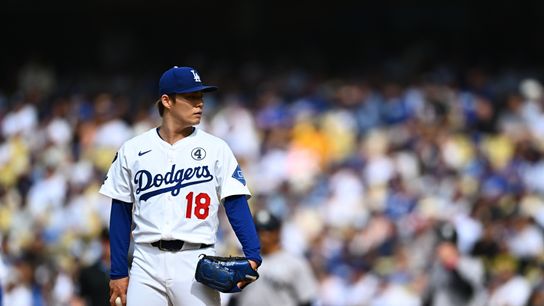 Los Angeles Dodgers starting pitcher Yoshinobu Yamamoto (18) on the mound against the New York Yankees during the first inning at Dodger Stadium. 