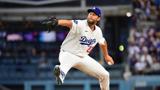 Los Angeles Dodgers pitcher Clayton Kershaw (22) throws a pitch against the New York Mets during the second inning at Dodger Stadium.