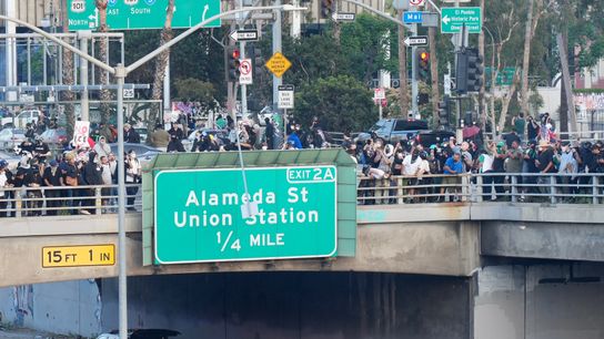 June 8, 2025; Los Angeles, CA, USA; A police car burns under an overpass near Union Station in Los Angeles on June 8, 2025. Clashes between law enforcement and protesters intensified on Sunday as California National Guard troops arrived in Los Angeles to quell demonstrations against President Donald Trump’s immigration crackdown, a move that the state's Democratic governor has called unlawful. June 8, 2025; Los Angeles, CA, USA; A police car burns under an overpass near Union Station in Los Angeles on June 8, 2025. Clashes between law enforcement and protesters intensified on Sunday as California National Guard troops arrived in Los Angeles to quell demonstrations against President Donald Trump’s immigration crackdown, a move that the state's Democratic governor has called unlawful.