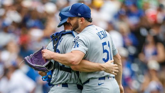 Los Angeles Dodgers relief pitcher Alex Vesia (51) celebrates with Los Angeles Dodgers catcher Will Smith (16) after defeating the San Diego Padres at Petco Park. Los Angeles Dodgers relief pitcher Alex Vesia (51) celebrates with Los Angeles Dodgers catcher Will Smith (16) after defeating the San Diego Padres at Petco Park.