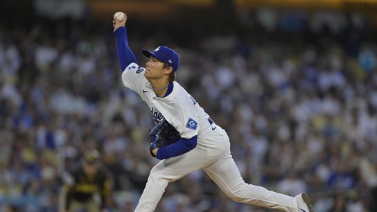 Los Angeles Dodgers pitcher Yoshinobu Yamamoto (18) delivers a pitch during the fourth inning against the San Diego Padres at Dodger Stadium. Los Angeles Dodgers pitcher Yoshinobu Yamamoto (18) delivers a pitch during the fourth inning against the San Diego Padres at Dodger Stadium.