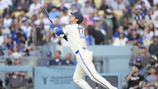 Los Angeles Dodgers two-way player Shohei Ohtani (17) flies out to center during the first inning against against the Washington Nationals at Dodger Stadium. Los Angeles Dodgers two-way player Shohei Ohtani (17) flies out to center during the first inning against against the Washington Nationals at Dodger Stadium.