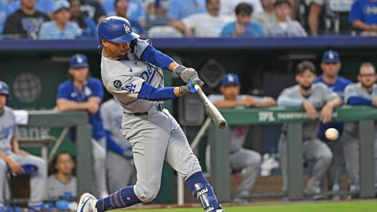 Los Angeles Dodgers shortstop Mookie Betts (50) singles in a run in the fifth inning against the Kansas City Royals at Kauffman Stadium. 