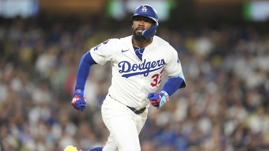 Los Angeles Dodgers right fielder Teoscar Hernandez (37) grounds out to Chicago White Sox second baseman Lenyn Sosa (50) in the eighth inning at Dodger Stadium. 