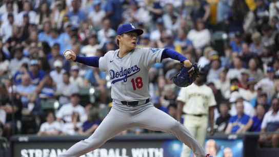 Los Angeles Dodgers pitcher Yoshinobu Yamamoto (18) delivers a pitch against the Milwaukee Brewers in the first inning at American Family Field. Los Angeles Dodgers pitcher Yoshinobu Yamamoto (18) delivers a pitch against the Milwaukee Brewers in the first inning at American Family Field.