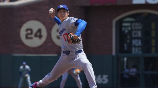 Los Angeles Dodgers starting pitcher Shohei Ohtani (17) throws a pitch against the San Francisco Giants during the third inning at Oracle Park.