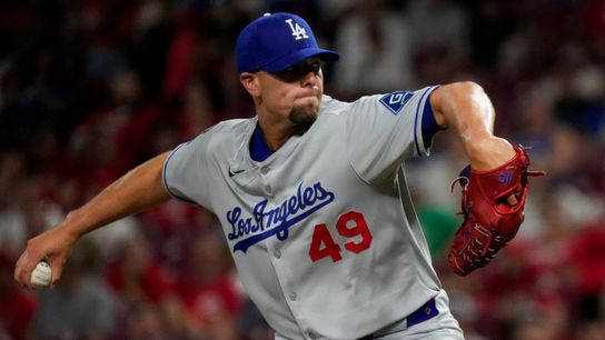 Los Angeles Dodgers pitcher Blake Treinen (49) throws a pitch in the ninth inning of the MLB National League game between the Cincinnati Reds and the Los Angeles Dodgers at Great American Ball Park in... 
