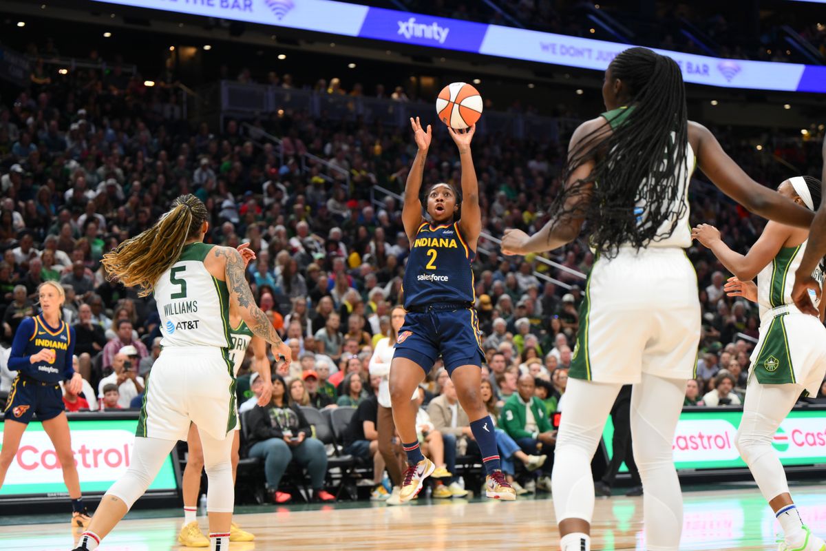Aug 3, 2025; Seattle, Washington, USA; Indiana Fever guard Aari McDonald (2) shoots the ball against the Seattle Storm during the first half at Climate Pledge Arena. Aug 3, 2025; Seattle, Washington, USA; Indiana Fever guard Aari McDonald (2) shoots the ball against the Seattle Storm during the first half at Climate Pledge Arena.