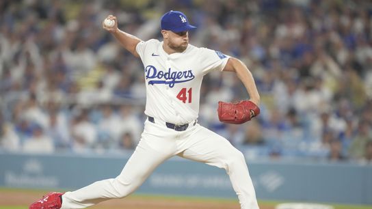 Los Angeles Dodgers pitcher Brock Stewart (41) delivers a pitch in the top of the ninth inning during an MLB game against the St. Louis Cardinals at Dodger Stadium. 