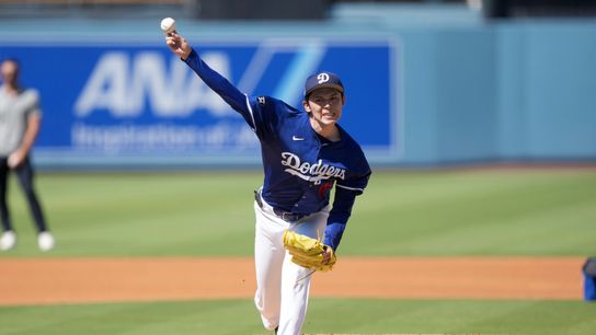 Los Angeles Dodgers pitcher Roki Sasaki (11) throws before the game against the Toronto Blue Jays at Dodger Stadium. Los Angeles Dodgers pitcher Roki Sasaki (11) throws before the game against the Toronto Blue Jays at Dodger Stadium.