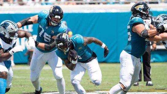 Jacksonville Jaguars running back Travis Etienne Jr. (1) finds a hole during the first quarter of an NFL football game between the Carolina Panthers at Jacksonville Jaguars at EverBank Stadium Sunday September 7, 2025.