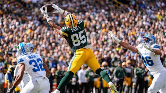 Green Bay Packers tight end Tucker Kraft (85) makes a catch for a touchdown against Detroit Lions safety Brian Branch (32) during the first half at Lambeau Field in Green Bay, Wis., on Sunday, September 7, 2025.