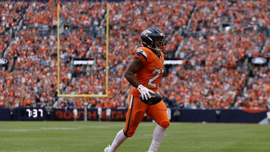 Sep 7, 2025; Denver, Colorado, USA; Denver Broncos running back J.K. Dobbins (27) rushes for a touchdown against the Tennessee Titans in the second half at Empower Field at Mile High. 