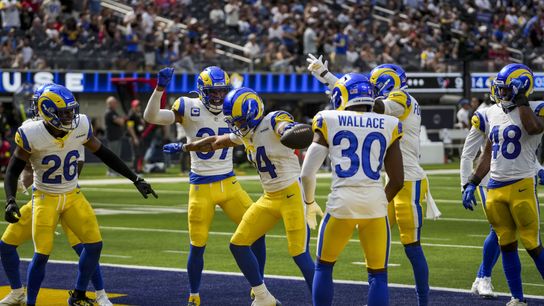 Sep 7, 2025; Inglewood, California, USA; Los Angeles Rams cornerback Cobie Durant (14) celebrates after intercepting a pass during the fourth quarter at SoFi Stadium. 
