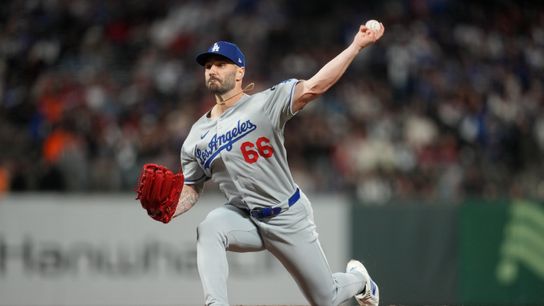 Los Angeles Dodgers pitcher Tanner Scott (66) delivers a pitch against the San Francisco Giants in the ninth nning at Oracle Park.