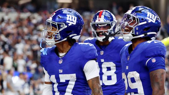Sep 14, 2025; Arlington, Texas, USA; New York Giants wide receiver Wan'Dale Robinson (17) celebrates after scoring a touchdown against the Dallas Cowboys during the fourth quarter at AT&T Stadium. 