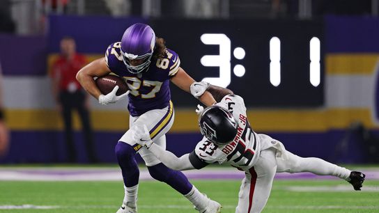 Sep 14, 2025; Minneapolis, Minnesota, USA; Minnesota Vikings tight end T.J. Hockenson (87) runs the ball as Atlanta Falcons safety Billy Bowman Jr. (33) defends during the second half at U.S. Bank Stadium