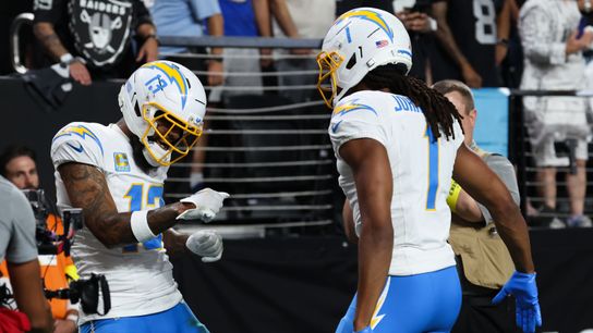 Sep 15, 2025; Paradise, Nevada, USA; Los Angeles Chargers wide receiver Keenan Allen (13) celebrates with Los Angeles Chargers wide receiver Quentin Johnston (1) after scoring a touchdown during the first quarter against the Las Vegas Raiders at Allegiant Stadium.