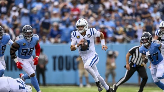 Sep 21, 2025; Nashville, Tennessee, USA; Indianapolis Colts quarterback Daniel Jones (17) scrambles during the first quarter at Nissan Stadium.