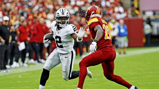 Sep 21, 2025; Landover, Maryland, USA; Las Vegas Raiders running back Ashton Jeanty (2) runs the ball during the second half against the Washington Commanders at Northwest Stadium. 
