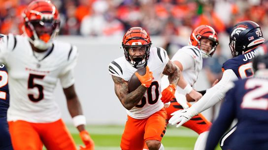 Sep 29, 2025; Denver, Colorado, USA; Cincinnati Bengals running back Chase Brown (30) rushes during the first quarter against the Denver Broncos at Empower Field at Mile High.