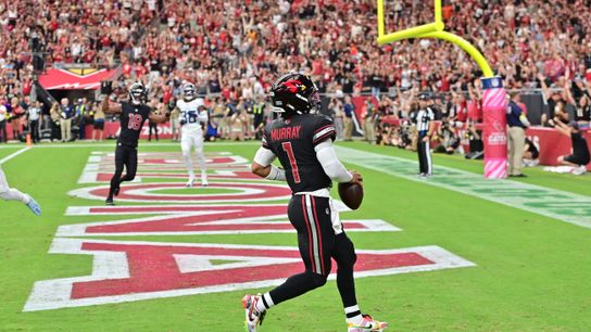 Oct 5, 2025; Glendale, Arizona, USA; Arizona Cardinals quarterback Kyler Murray (1) runs for a touchdown against the Tennessee Titans during the first quarter at State Farm Stadium.