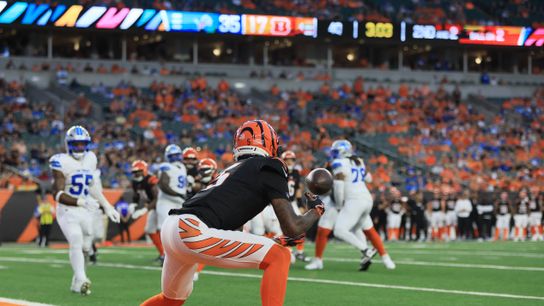 Oct 5, 2025; Cincinnati, Ohio, USA; Cincinnati Bengals wide receiver Tee Higgins (5) catches a touchdown pass during the fourth quarter against the Detroit Lions at Paycor Stadium.