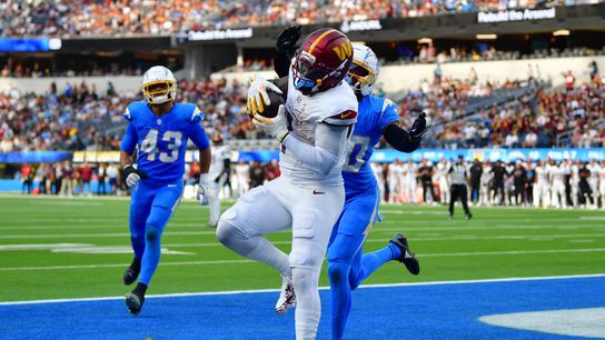 Oct 5, 2025; Inglewood, California, USA; Washington Commanders wide receiver Deebo Samuel Sr. (1) makes a catch for a touchdown against the Los Angeles Chargers in the second half at SoFi Stadium.