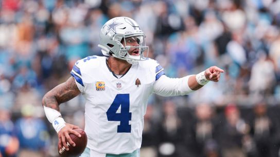 Oct 12, 2025; Charlotte, North Carolina, USA; Dallas Cowboys quarterback Dak Prescott (4) communicates during the second half against the Carolina Panthers at Bank of America Stadium.