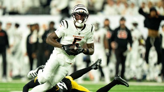 Cincinnati Bengals wide receiver Tee Higgins (5) catches a pass and runs for a touchdown in the second quarter of the NFL game between the Cincinnati Bengals and Pittsburgh Steelers at Paycor Stadium in Cincinnati on Oct. 16, 2025.