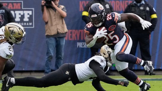 Oct 19, 2025; Chicago, Illinois, USA; Chicago Bears running back Kyle Monangai (25) runs the ball against the New Orleans Saints during the second half at Soldier Field. 