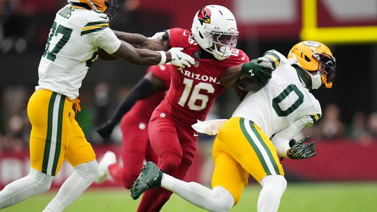 Arizona Cardinals cornerback Max Melton (16) breaks away from a block by Green Bay Packers receiver Romeo Doubs (87) to tackle Matthew Golden (0) at State Farm Stadium in Glendale on Oct. 19, 2025.