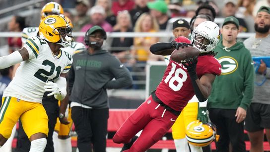 Arizona Cardinals receiver Marvin Harrison Jr. (18) catches a pass along the sidelines against the Green Bay Packers at State Farm Stadium in Glendale on Oct. 19, 2025.