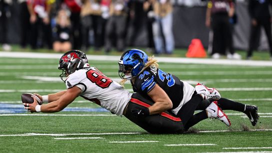 Oct 20, 2025; Detroit, Michigan, USA; Tampa Bay Buccaneers tight end Cade Otton (88) makes a catch against Detroit Lions middle linebacker Alex Anzalone (34) during the second half at Ford Field.