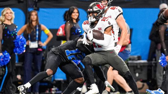 Tampa Bay Buccaneers wide receiver Tez Johnson (15) runs for a touchdown against Detroit Lions safety Thomas Harper (12) during the second half at Ford Field in Detroit on Monday, Oct. 20, 2025.
