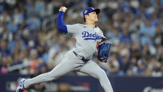 Los Angeles Dodgers pitcher Yoshinobu Yamamoto (18) pitches against the Toronto Blue Jays in the second inning during game two of the 2025 MLB World Series at Rogers Centre. 