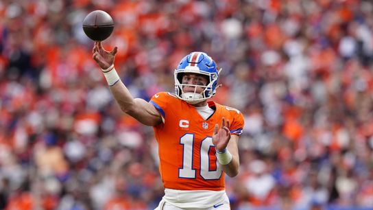 Oct 26, 2025; Denver, Colorado, USA; Denver Broncos quarterback Bo Nix (10) throws a pass against the Dallas Cowboys in the fourth quarter at Empower Field at Mile High.