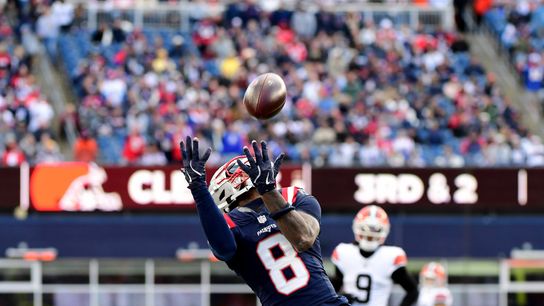 Oct 26, 2025; Foxborough, Massachusetts, USA; New England Patriots wide receiver Stefon Diggs (8) reaches for the ball during the second half against the Cleveland Browns at Gillette Stadium.