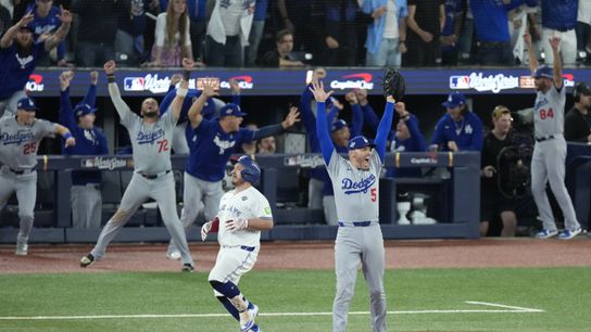 Los Angeles Dodgers first baseman Freddie Freeman (5) celebrates after defeating the Toronto Blue Jays in game seven of the 2025 MLB World Series at Rogers Centre. 
