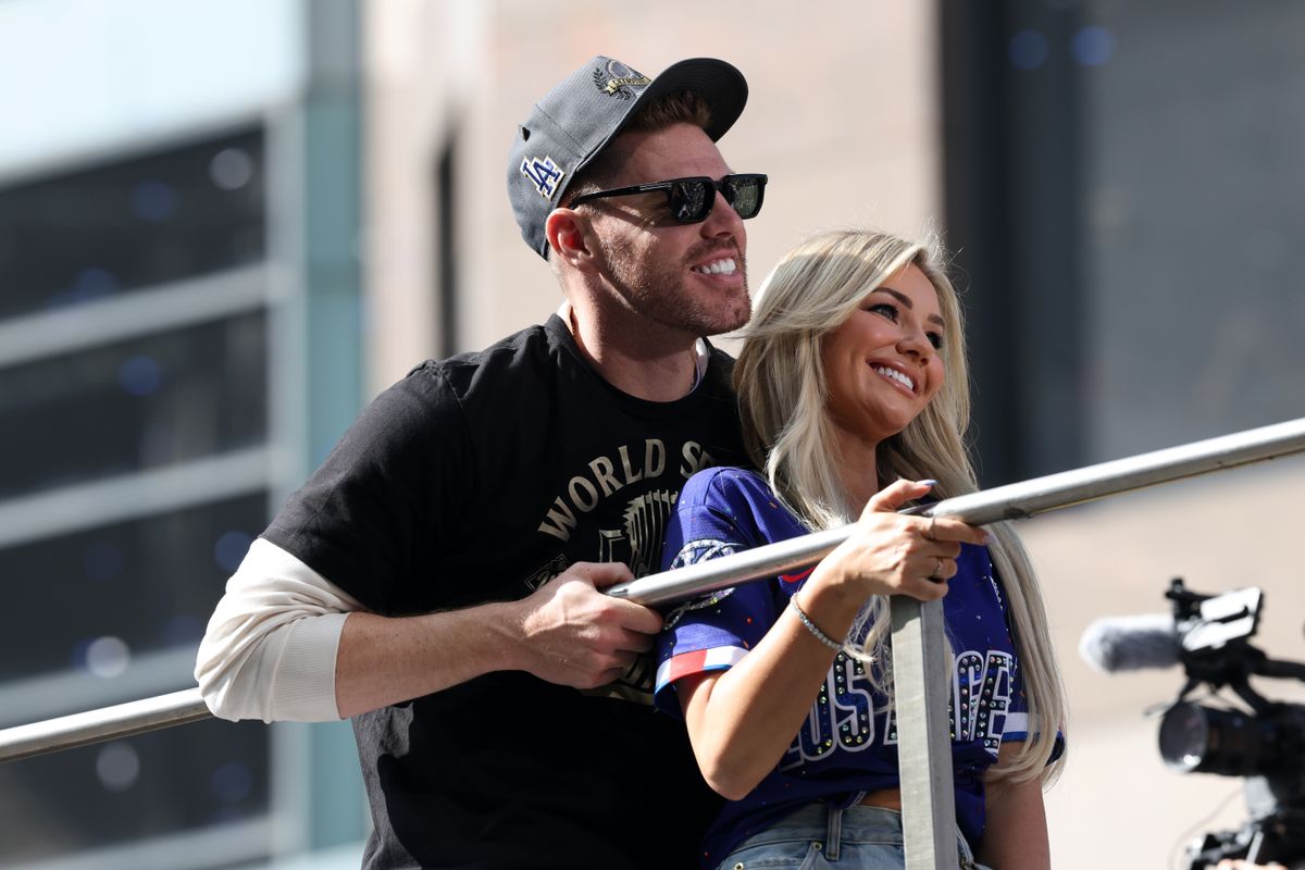 Nov 3, 2025; Los Angeles, CA, USA; Los Angeles Dodgers first baseman Freddie Freeman acknowledges the crowd during the World Series championship parade at downtown Los Angeles.