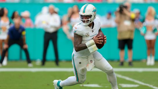 Nov 9, 2025; Miami Gardens, Florida, USA; Miami Dolphins quarterback Tua Tagovailoa (1) rolls out during the first half against the Buffalo Bills at Hard Rock Stadium Nov 9, 2025; Miami Gardens, Florida, USA; Miami Dolphins quarterback Tua Tagovailoa (1) rolls out during the first half against the Buffalo Bills at Hard Rock Stadium